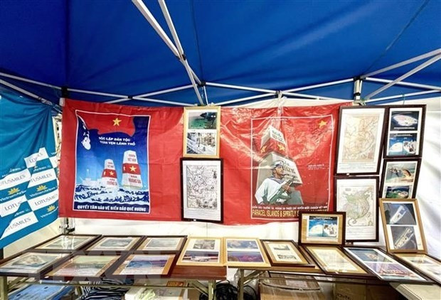 Posters, documents and photos displayed at the booth (Photo: VNA)