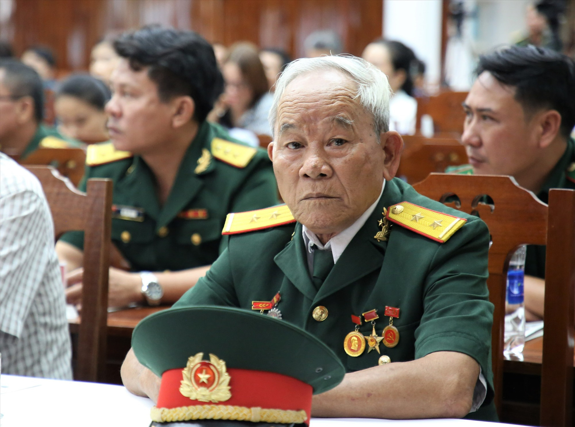 Anh hùng Lực lượng vũ trang nhân dân Hồ Xuân Quang tham dự lễ công bố. Ảnh: A.N