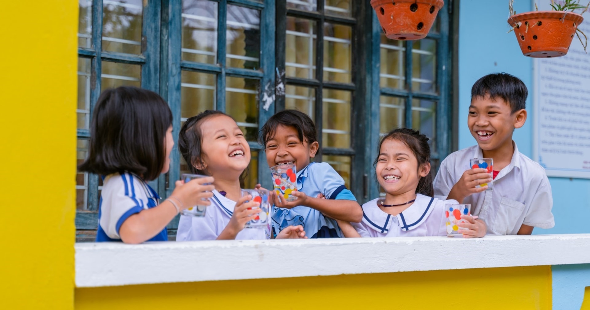 Students use clean water from the water treatment system donated by Lifestart Foundation