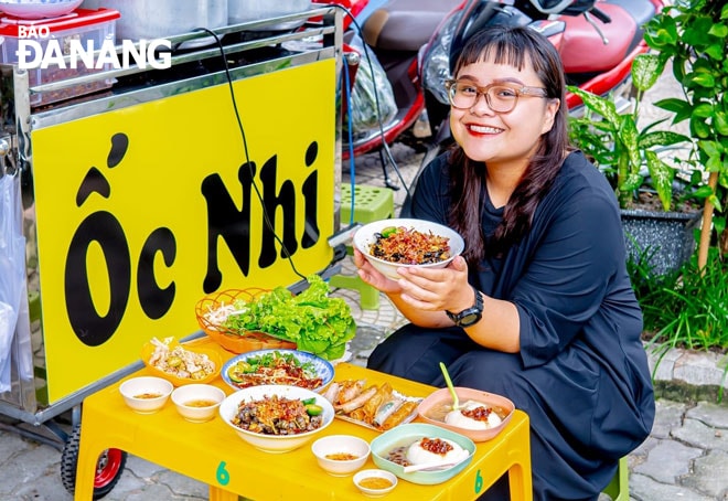 Giới trẻ xem món ốc hút là món ăn đường phố hấp dẫn. Ảnh: T.Y