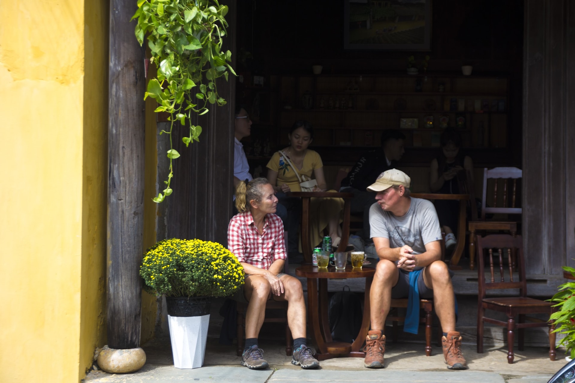 Micheal (right), a German going to Hoi An on the occasion of the Tet festival, loves Hoi An for its historical and cultural values. It is the third time he has gone to Hoi An.