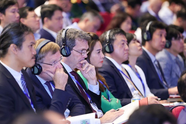 Các đại biểu quốc tế dự Hội nghị - Ảnh: VGP/Nhật Bắc