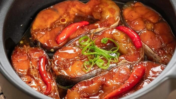 Braised fish   It is a Vietnamese specialty made of fatty fish cuts that are braised in traditional clay pots with fish sauce, sugar, and coconut water. The dish is traditionally served with rice.