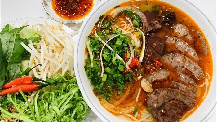Hue-styled beef noodle soup   There are 4 flavours, including sour, spicy, salty and sweet. Its broth is simmered with beef bones, lemongrass and fish sauce with a traditional recipe.