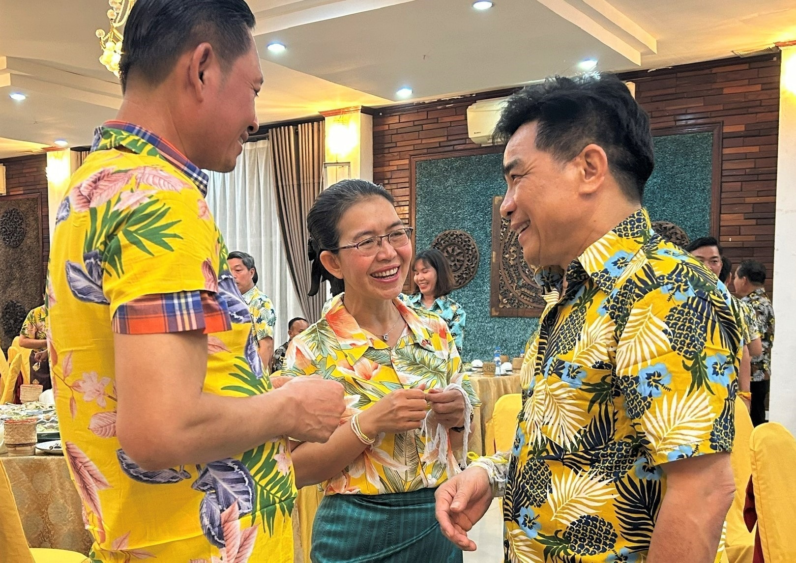 Mr. Dung talks with Lao friends