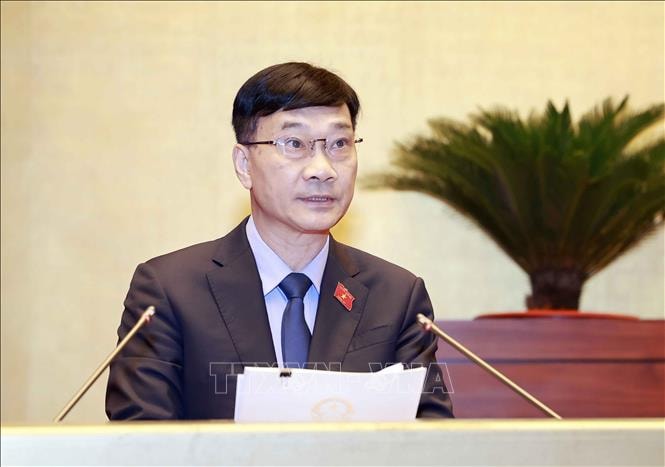 Ủy viên Ủy ban Thường vụ Quốc hội, Chủ nhiệm Ủy ban Kinh tế của Quốc hội Vũ Hồng Thanh trình bày Báo cáo giải trình, tiếp thu, chỉnh lý dự thảo Luật Hợp tác xã (sửa đổi). Ảnh: Doãn Tấn/TTXVN
