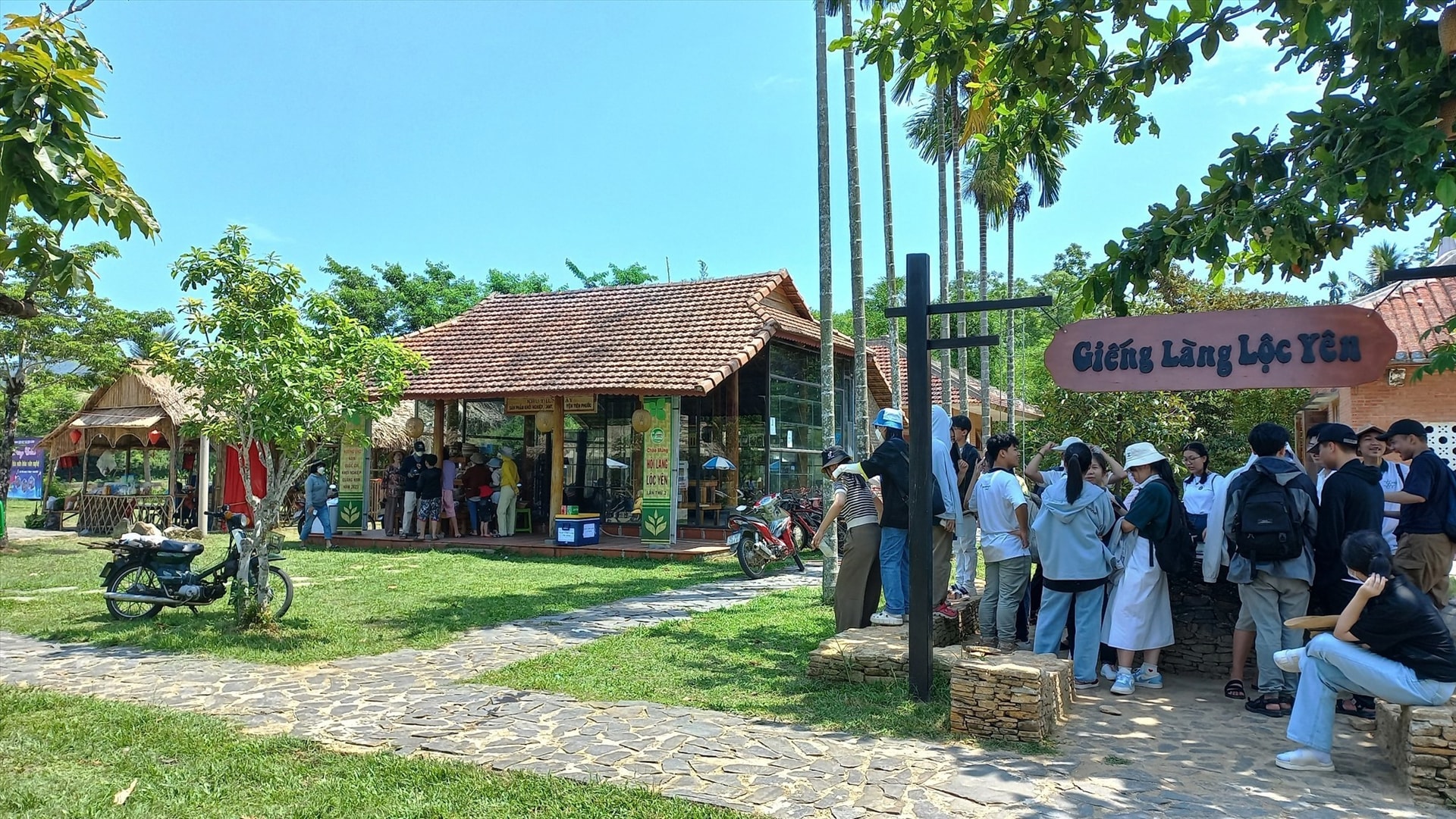 Local people and visitors at the market