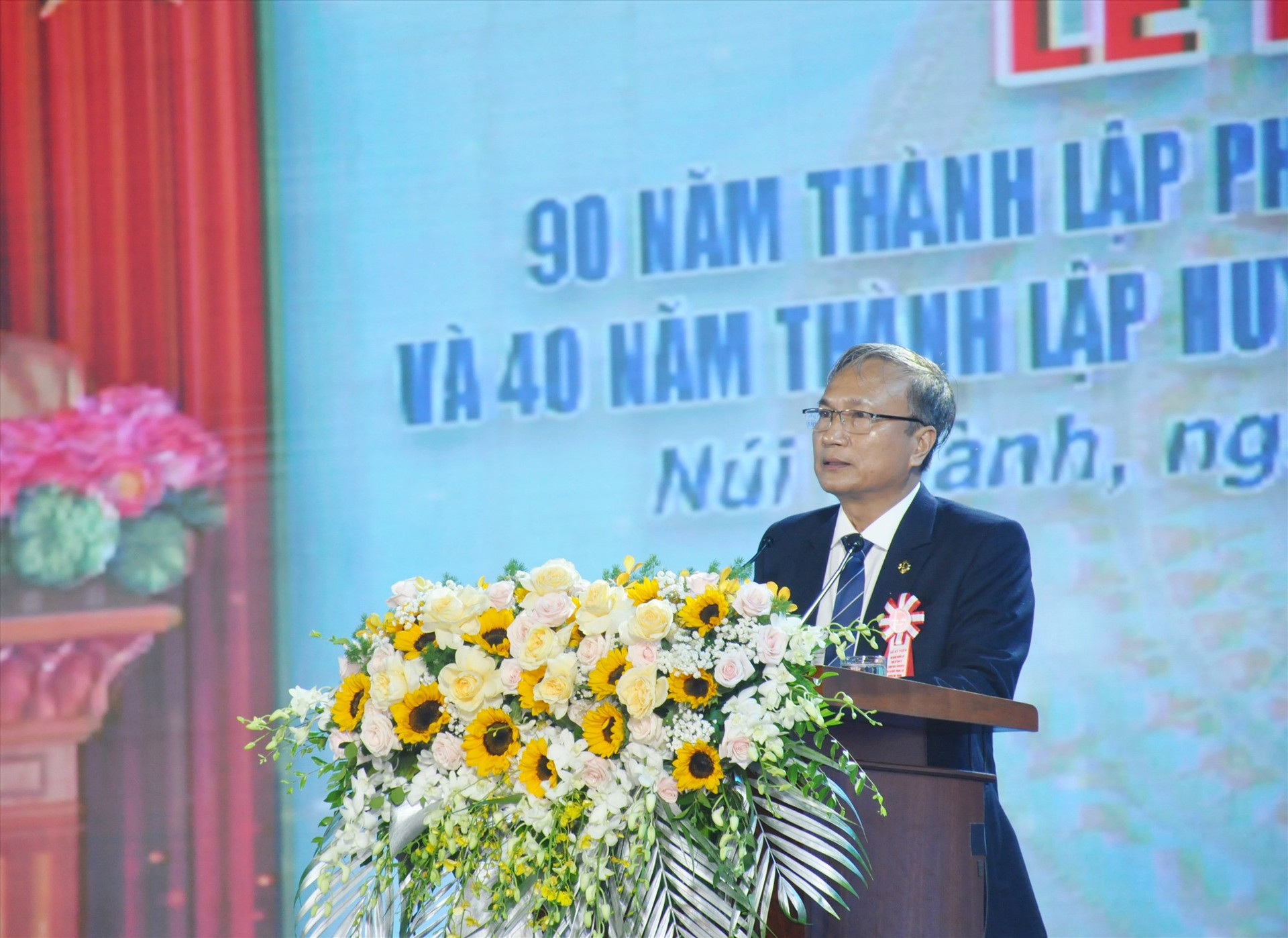 Bí thư Huyện ủy Nguyễn Tri Ấn phát biểu diễn văn lễ kỷ niệm. Ảnh: N.Đ