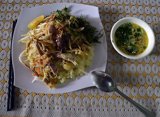 Served with a shredded green papaya and carrot slaw, and herby broth – “it’s mint, coriander and spring onion”, says the waitress – the boiled chicken was soft, the rice glossy, while chilli sauce that packs a punch is a must.