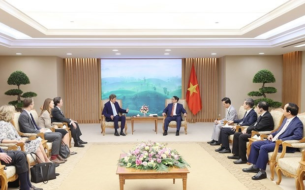 PM Pham Minh Chinh (R) and US Special Presidential Envoy for Climate John Kerry at their meeting in Hanoi on September 9 (Photo: VNA)