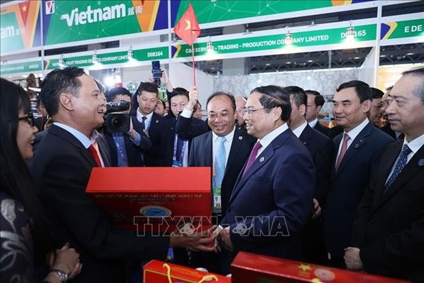 Prime Minister Pham Minh Chinh at the expo. (Photo: VNA)