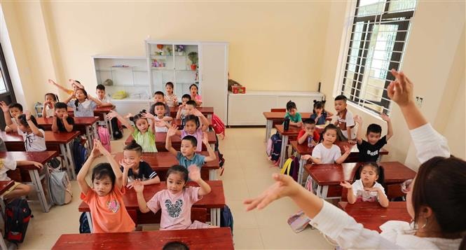 Học sinh Quảng Bình đón năm học mới. Ảnh: Thanh Tùng/TTXVN