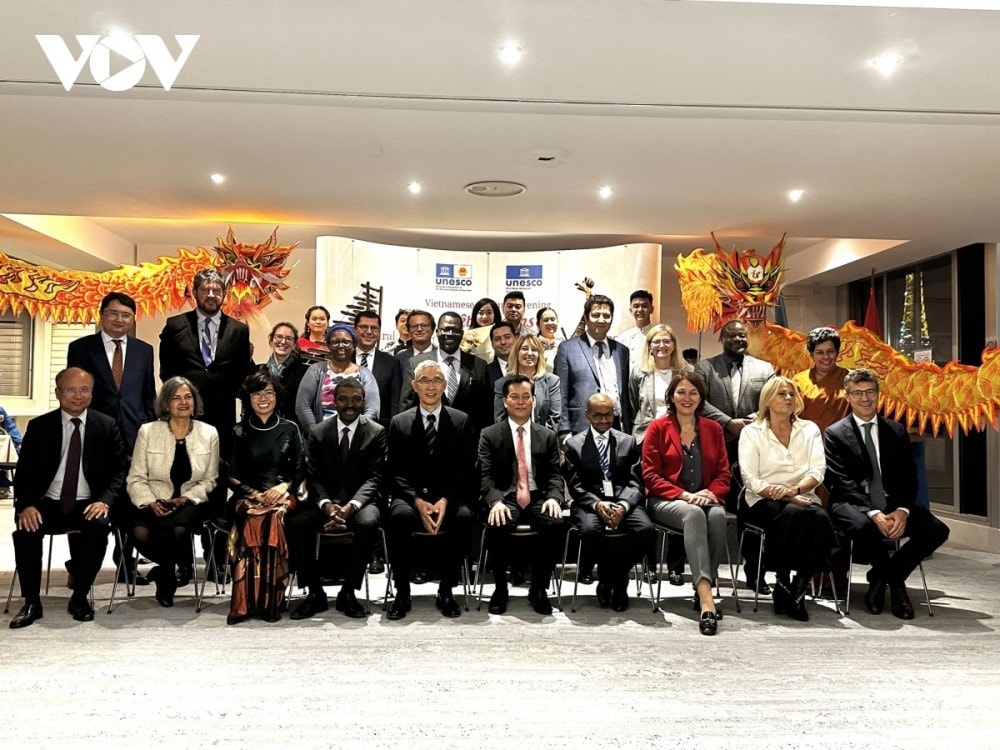 Delegates pose for a group photo.