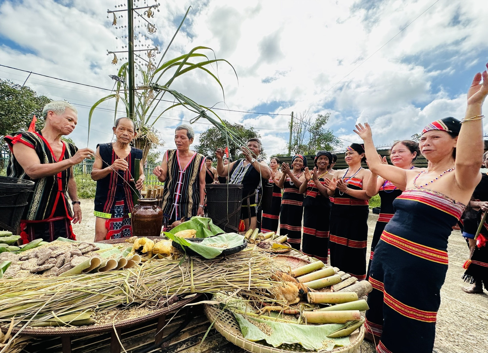 The villagers with the joy of celebrating the new rice harvest.