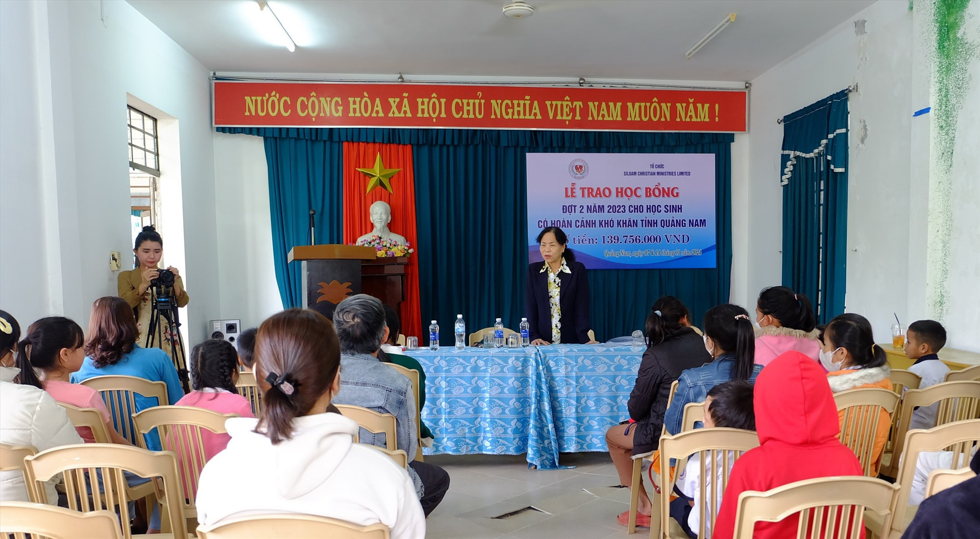 Bà Nguyễn Thị Thương - Phó Chủ tịch Hội Bảo trợ người khuyết tật, quyền trẻ em và bệnh nhân nghèo Quảng Nam phát biểu tại chương trình. Ảnh: M.L