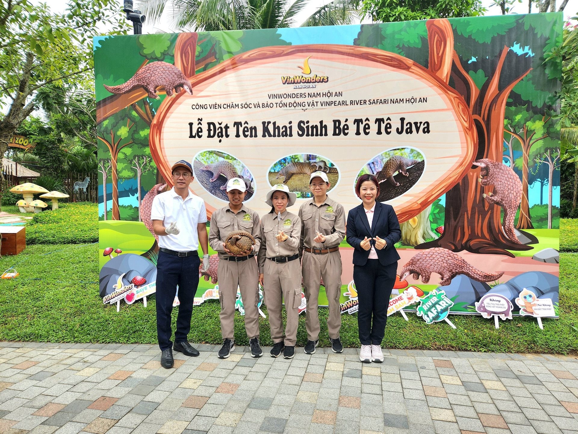 The team of managers and caretakers of the baby Javan pangolin after birth at the ceremony