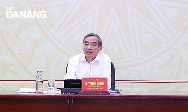 Chủ tịch UBND thành phố Lê Trung Chinh chủ trì phiên họp thường kỳ tháng 6-2025. Ảnh: XUÂN HẬU