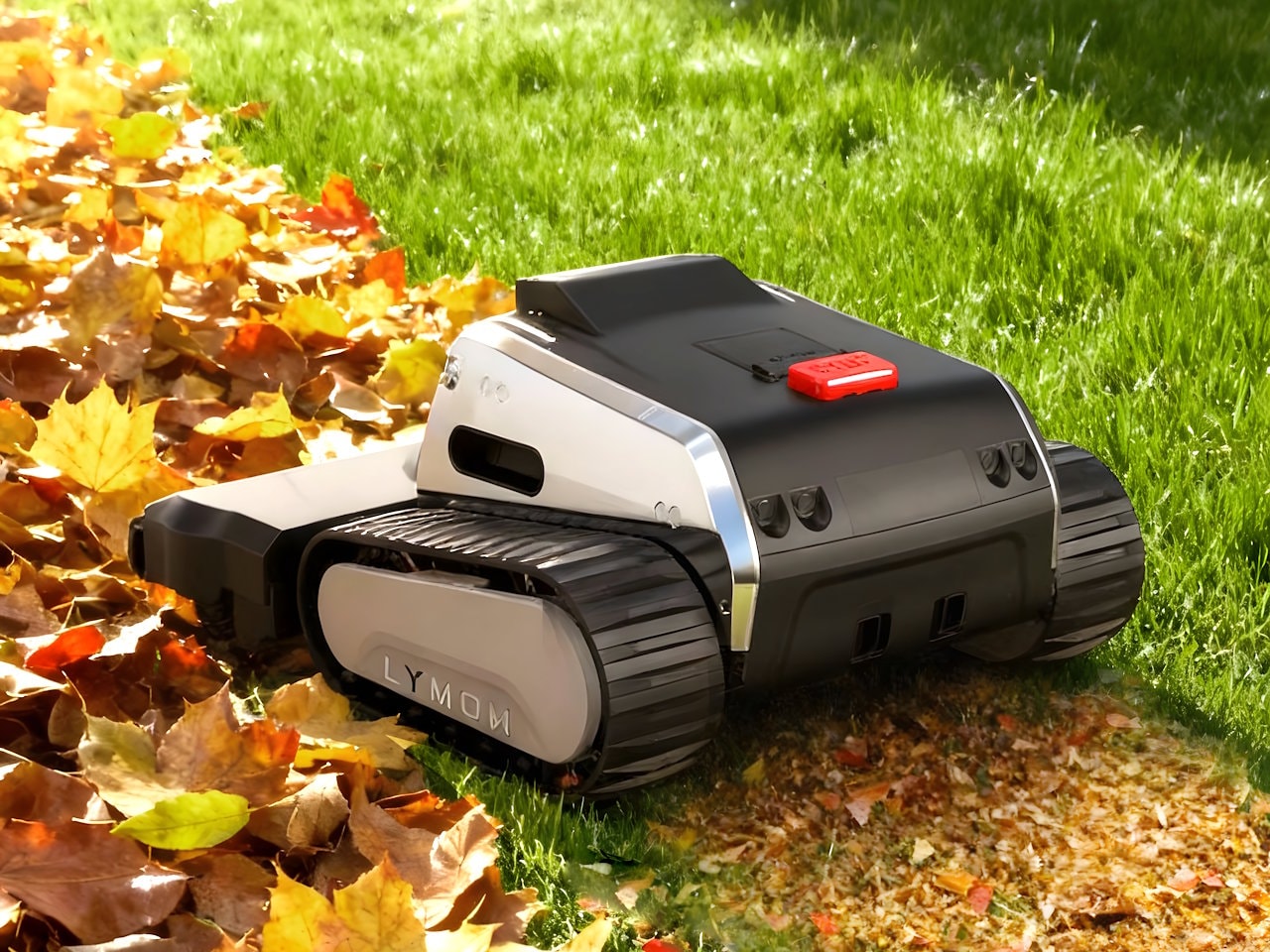 Robot cắt cỏ Lymow One Plus với hệ thống bánh xích xe tăng di chuyển trên địa hình gồ ghề.