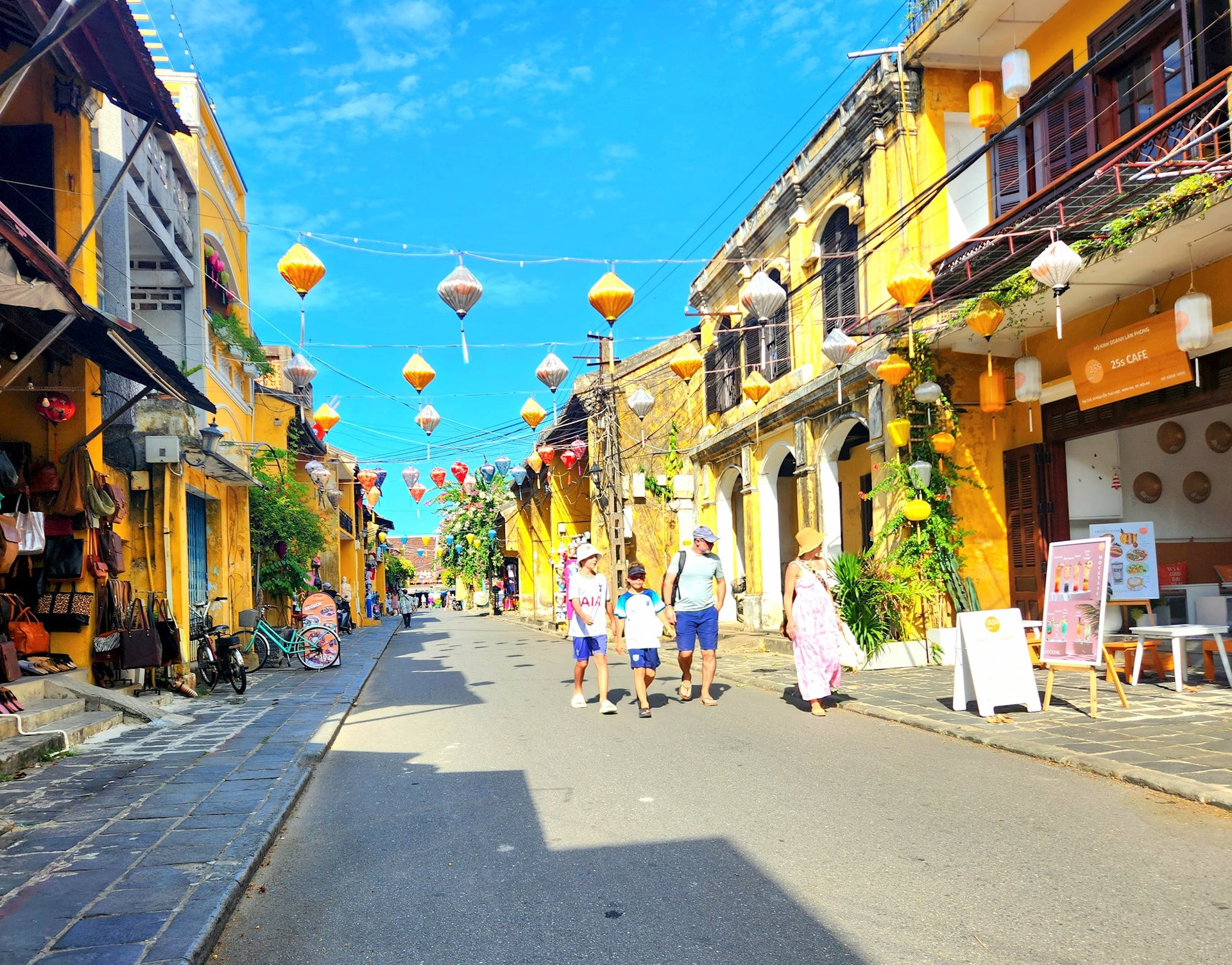 Visitors stroll through Hoi An Ancient Town.