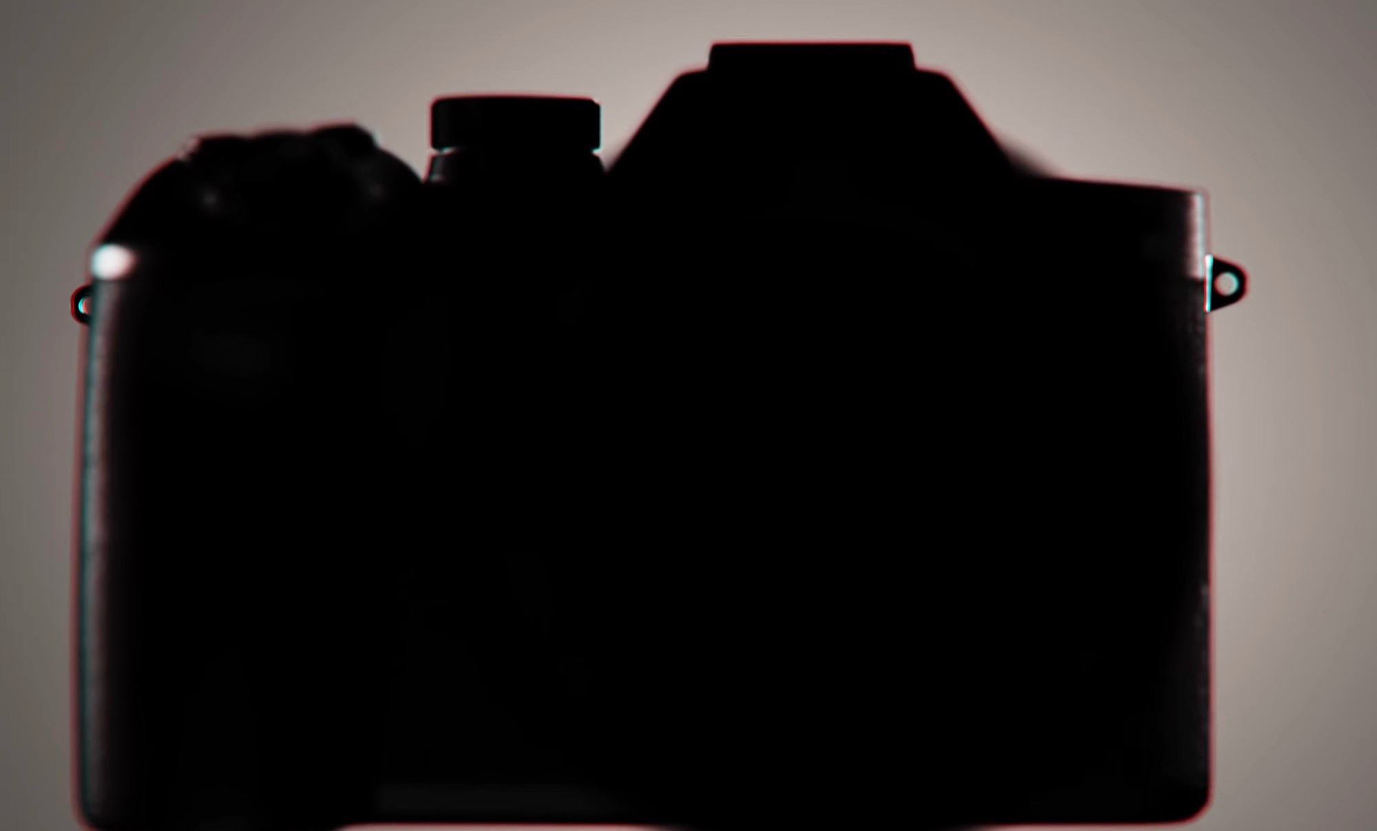Silhouette of the Sony RX10 V showing significant design changes.