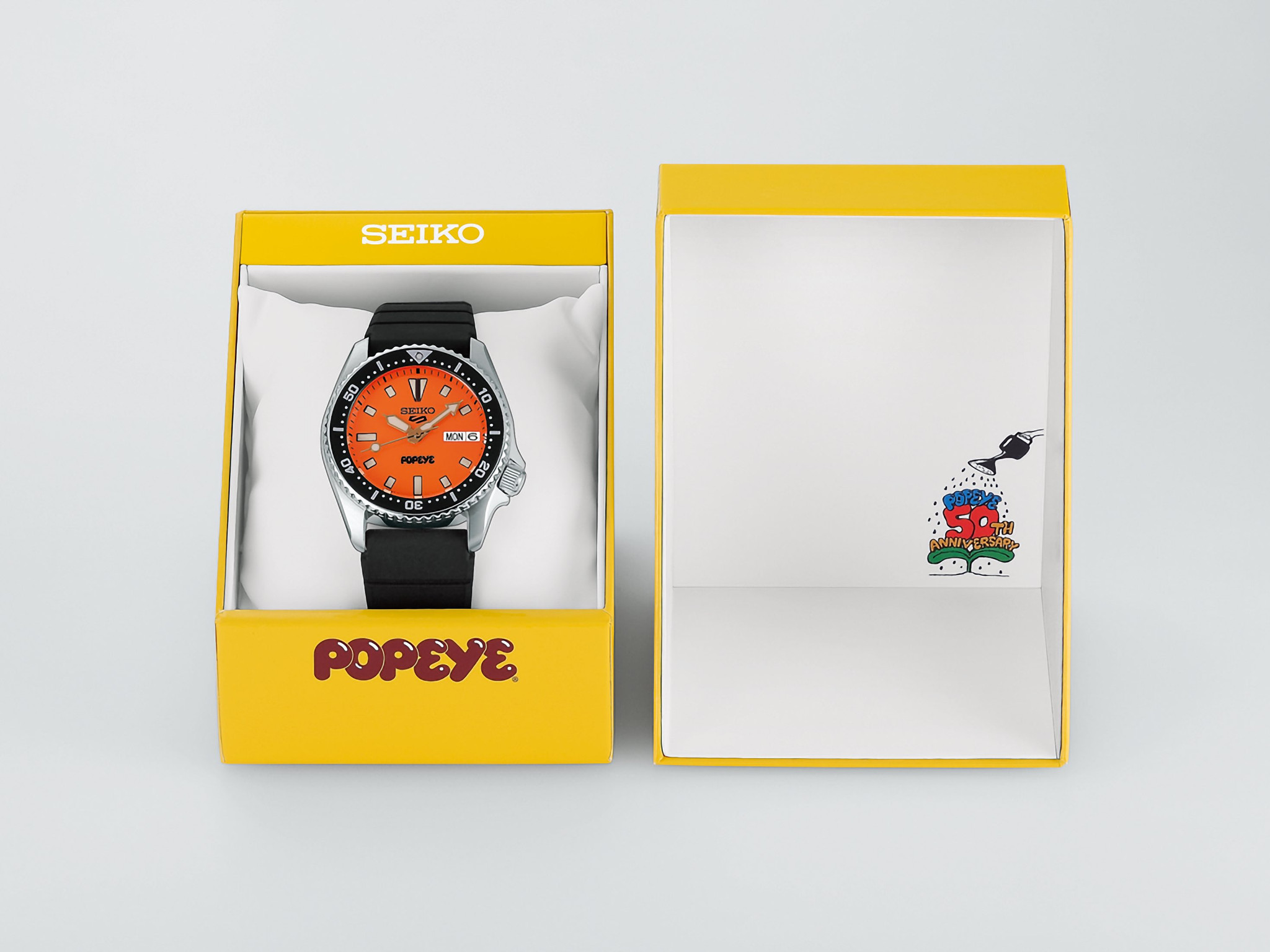 Seiko 5 Sports x Popeye HDB013 với mặt số cam và hộp đựng giới hạn màu vàng