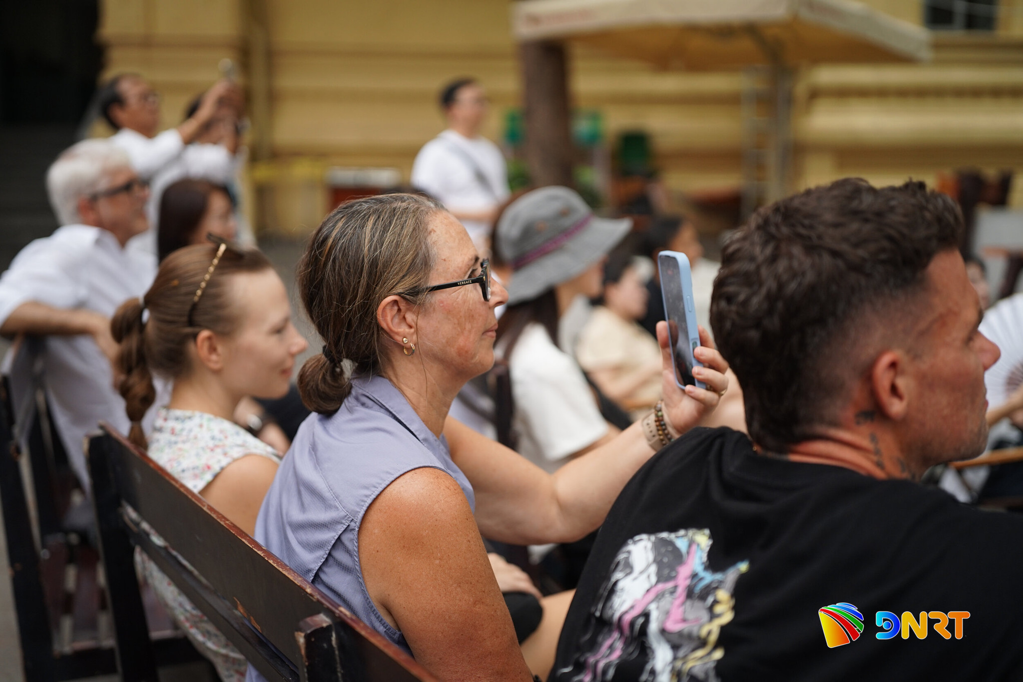 International visitors enjoy the performances at the “Champa Dance” programme. Photo: XUAN SON