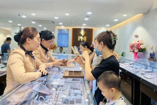Vàng tăng giá, giao dịch trầm lắng